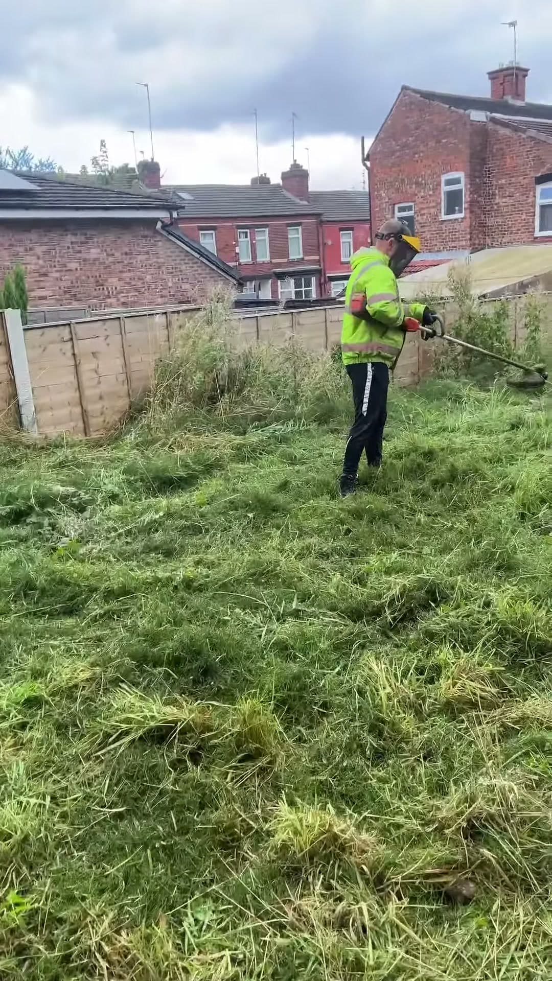 JG Groundcare operative clearing overgrown vegetation