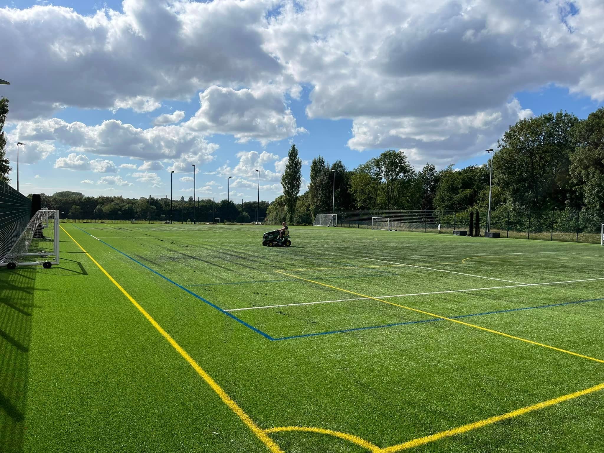 Court surface with crisp yellow and white painted line markings