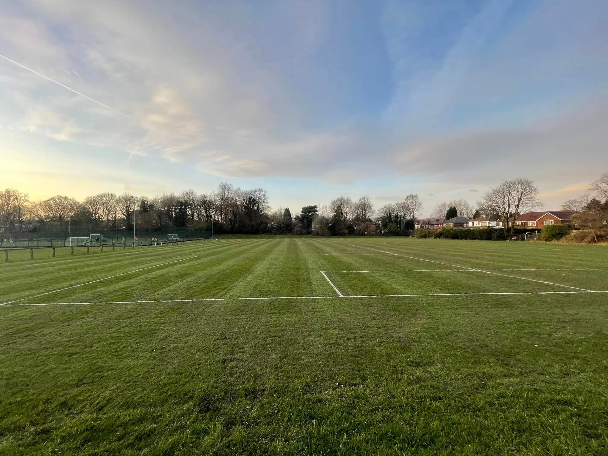 Wide view of a freshly marked sports pitch
