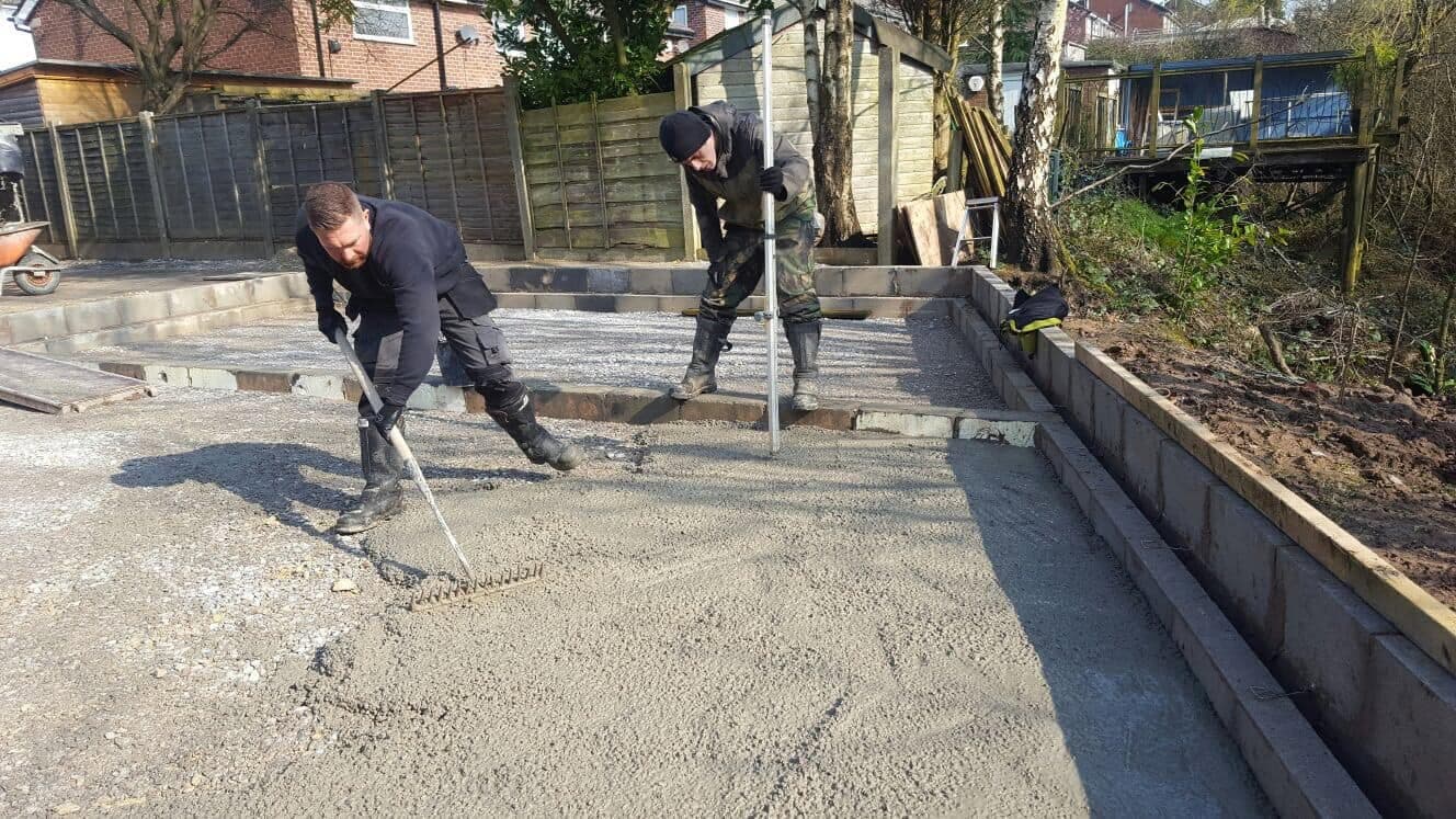 JG Groundcare team laying paving on a commercial site